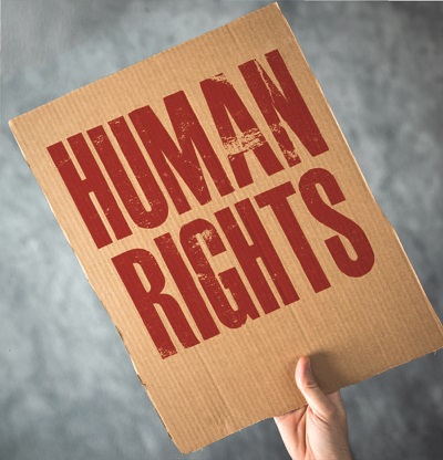 Schild mit roter Schrift Human Rights